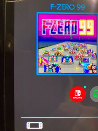 Nintendo Switch OLED con controller rosso Mario e altro