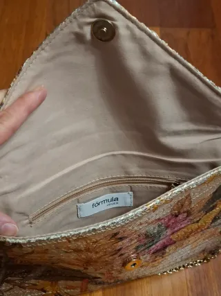 Bolso de mano "Fórmula Joven" con cadena.