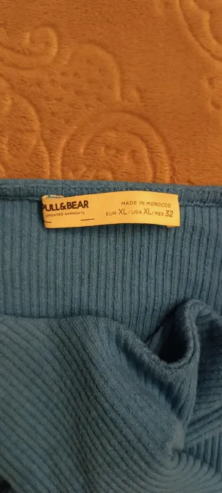 Camiseta azul cruzada