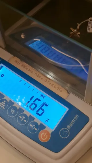 Cruz oro 18k con perla