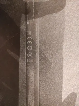 PS3 Slim + 2 Mandos + 5 Juegos