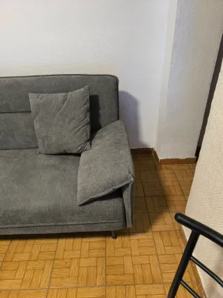 Sofá cama gris tela