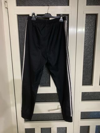 Tuta Adidas nera con strisce bianche