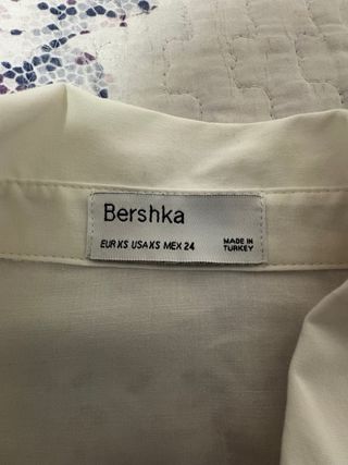 Blusa blanca entallada