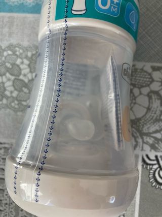 Biberón y chupete Chicco 0+M