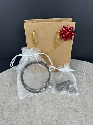 Gargantilla y pendientes pluma cuero y plata