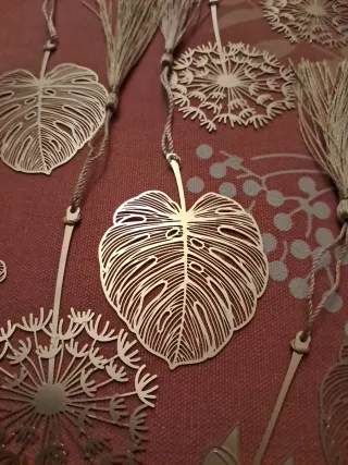 1x5e.Marcapáginas dorados.