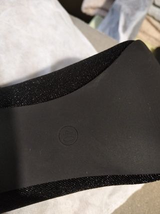 Botas pretas com salto alto