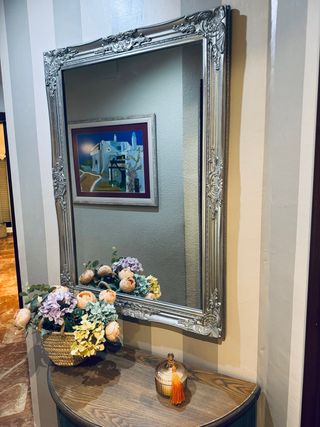 Espejo plateado decorativo