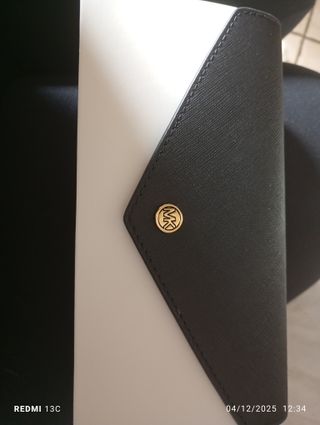 Portafoglio Michael Kors nero e oro