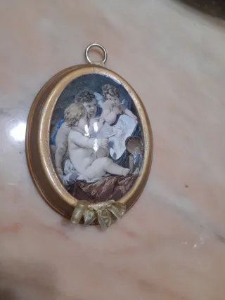 Antico quadro in porcellana con angeli