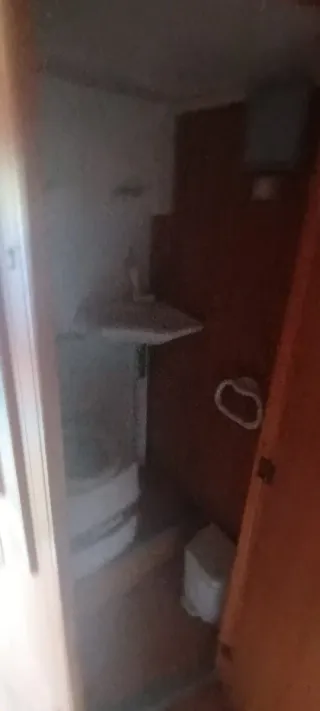 Caravana restaurada con placa solar y su document