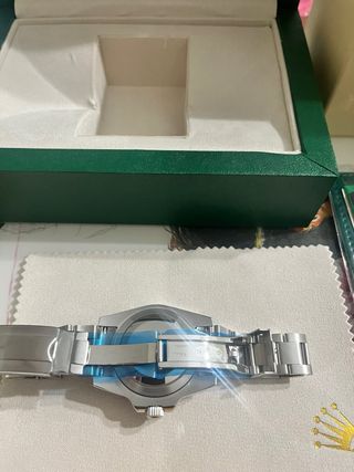 Reloj olex Verde y Plateado