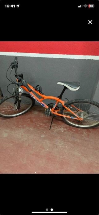 Bicicleta Orbea Naranja para niños de unos 8 años