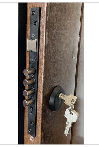 Puerta entrada rústica PVC Nogal