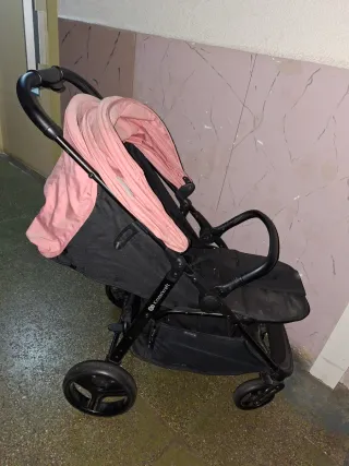 Carrito de bebé rosa y negro