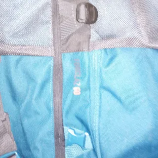 Mochila Quechua Negra y Turquesa