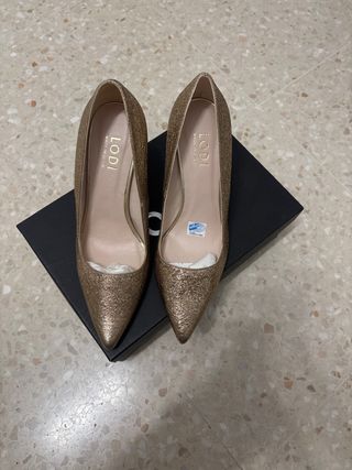 Zapatos Lodi dorados tacón mujer