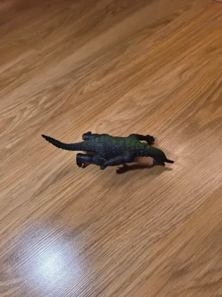 Figura de dinosaurio de juguete