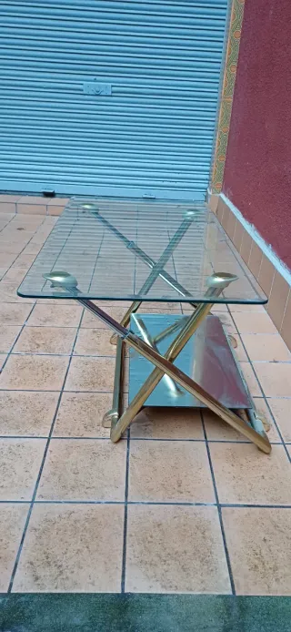 Mesa de centro cristal y metal dorado