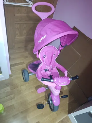 Triciclo Juguettos rosa con capota