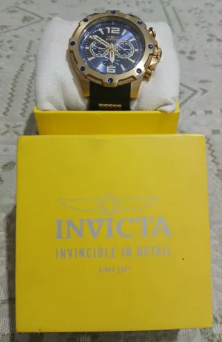 Reloj Invicta Dorado y Negro Original como nuevo
