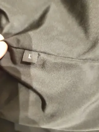 Chaquetón negro pelo conejo muy favorecedor.