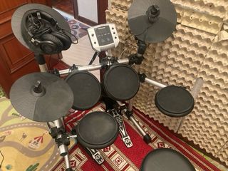 Batería electrónica Millenium MPS-150 +cascos+banq