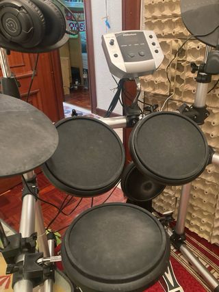 Batería electrónica Millenium MPS-150 +cascos+banq