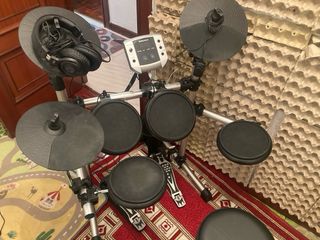 Batería electrónica Millenium MPS-150 +cascos+banq