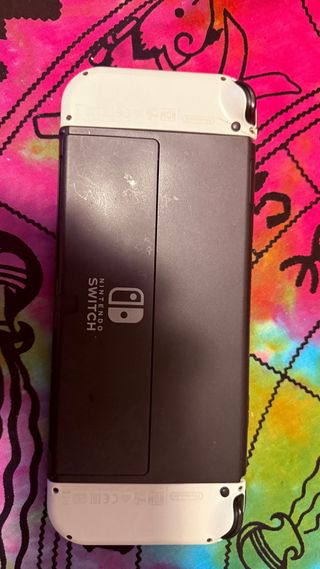 Nintendo Switch OLED + borsa + controller di ricarica