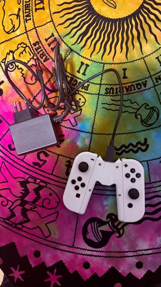 Nintendo Switch OLED + borsa + controller di ricarica