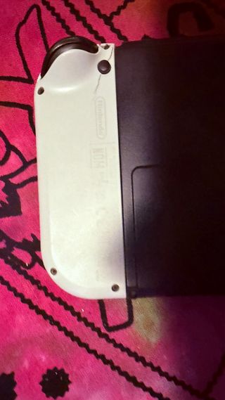 Nintendo Switch OLED + borsa + controller di ricarica