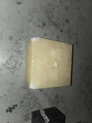 12 Peanas  de mármol negro veteado