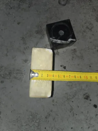 12 Peanas  de mármol negro veteado