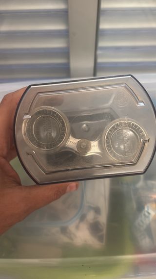 Prismáticos antiguos con funda