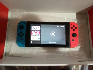 Nintendo Switch con scheda da 64GB + Giochi