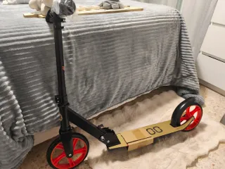 Patinete Olsson Negro y naranja