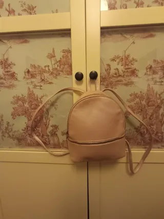 Mochila rosa. Primark. Un solo uso.