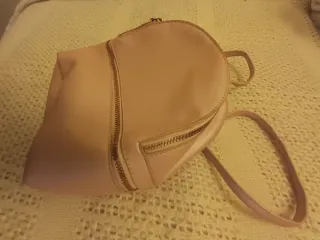Mochila rosa. Primark. Un solo uso.