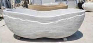 Bañera de mármol tallado a mano