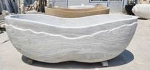 Bañera de mármol tallado a mano