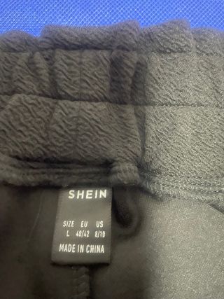 Falda corta negra con cinturón falda ahora