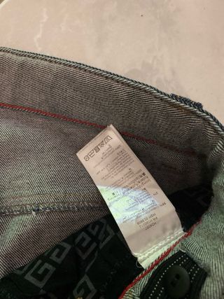 Jeans Givenchy neri con banda logo