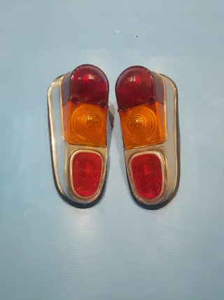 Pareja pilotos traseros R4 L cromados