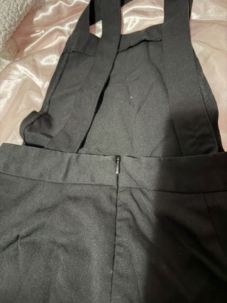 Mono peto negro con botones