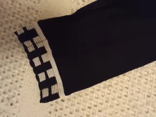 Jersey negro de manga tres cuartos