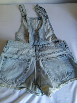 Peto vaquero corto desgastado