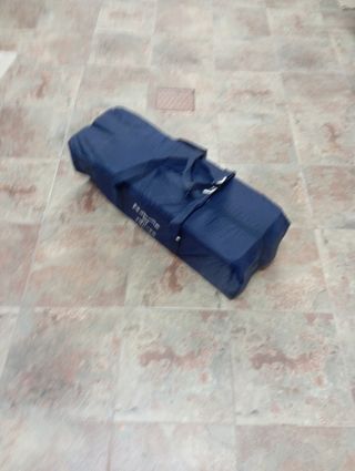 Cuna de viaje azul