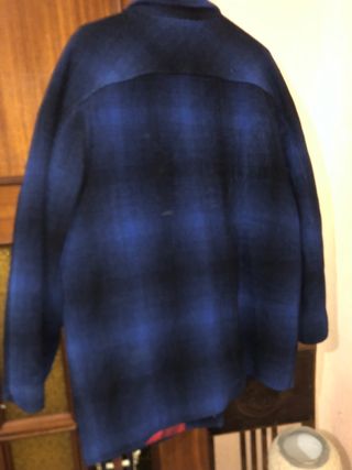 Chaqueta de cuadros azul y negra